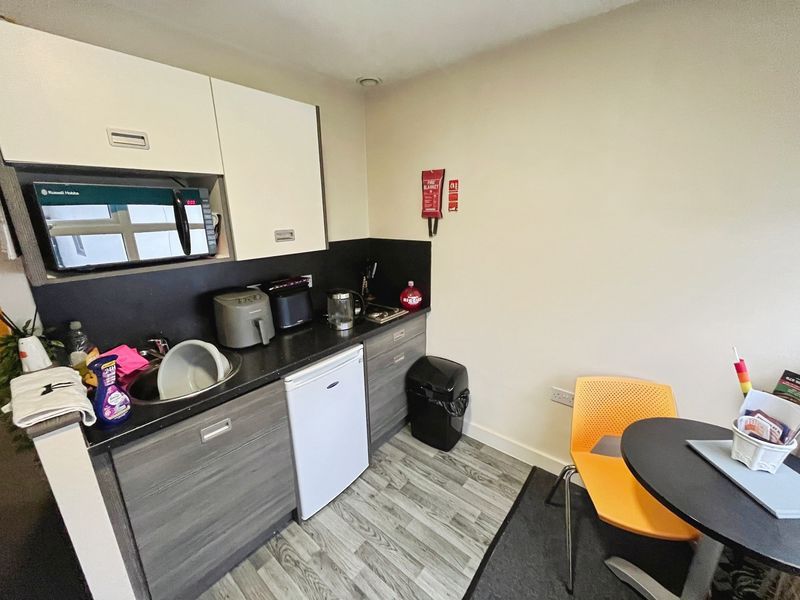 Property photo 2 of 15 Kitchen Area