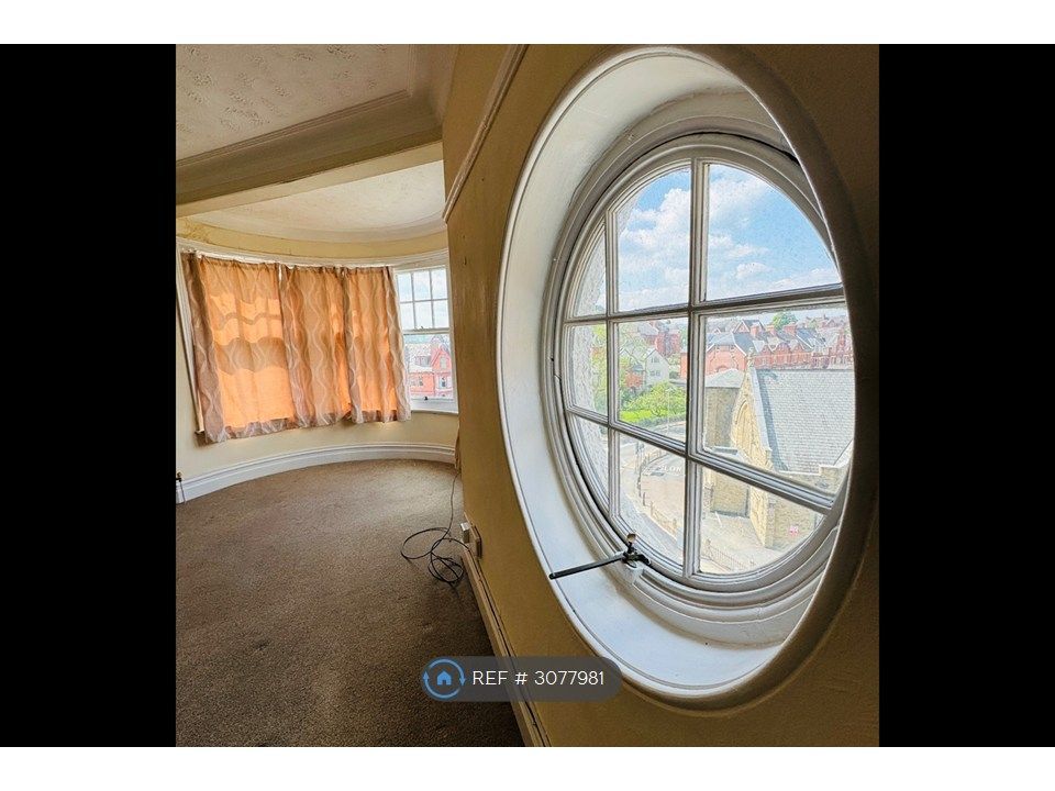 Property photo 1 of 16 Huge Round Window Is A Unique Feature