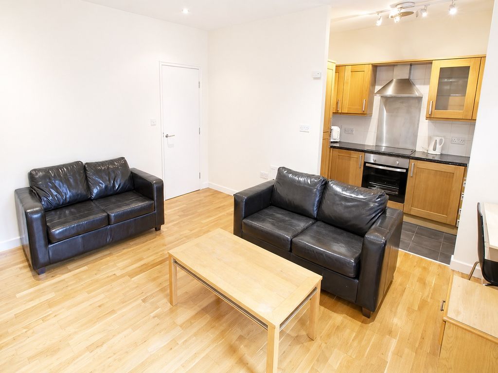 Property photo 2 of 7 Bright Open-Plan Lounge With Sleek Leather Sofas...