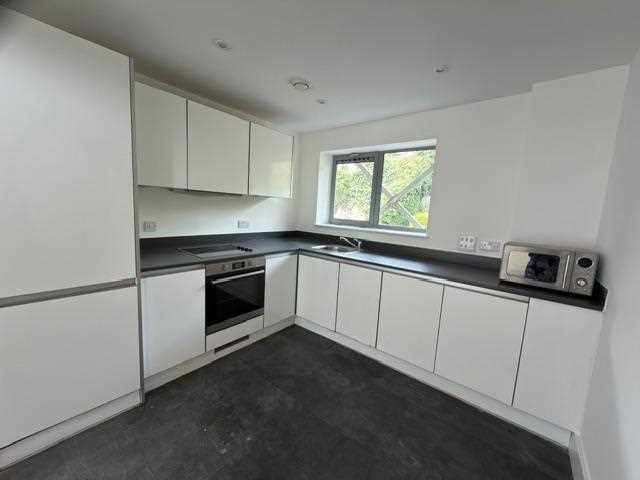 Property photo 2 of 8 Kitchen