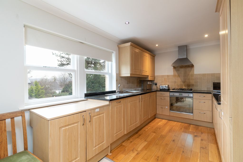 Property photo 3 of 12 Kitchen