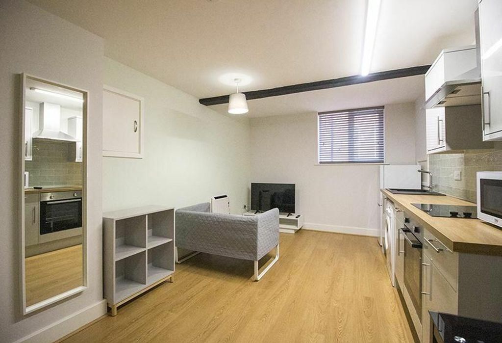Property photo 3 of 6 This Inviting Living Room Features A Contemporary ...