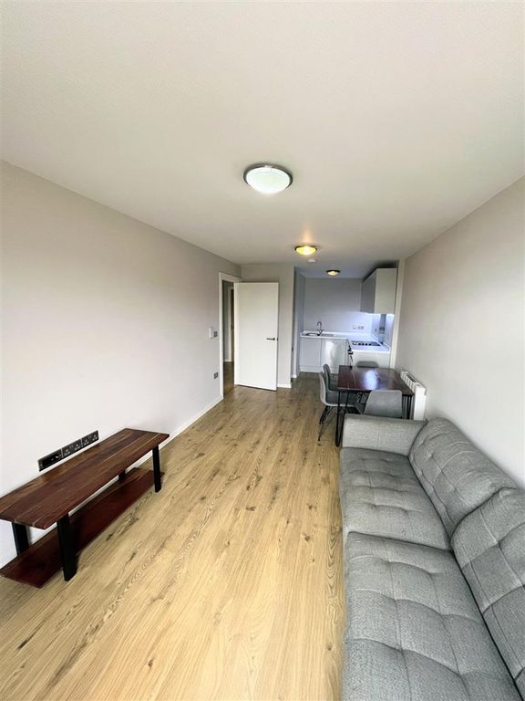 Property photo 1 of 8 Living/Dining Room