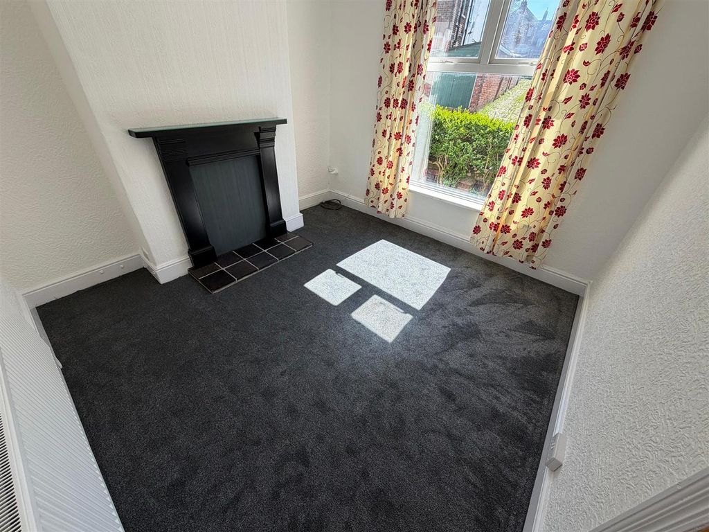 Property photo 2 of 17 Front Lounge