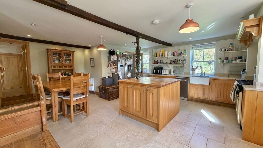 Property photo 3 of 17 Dining Kitchen