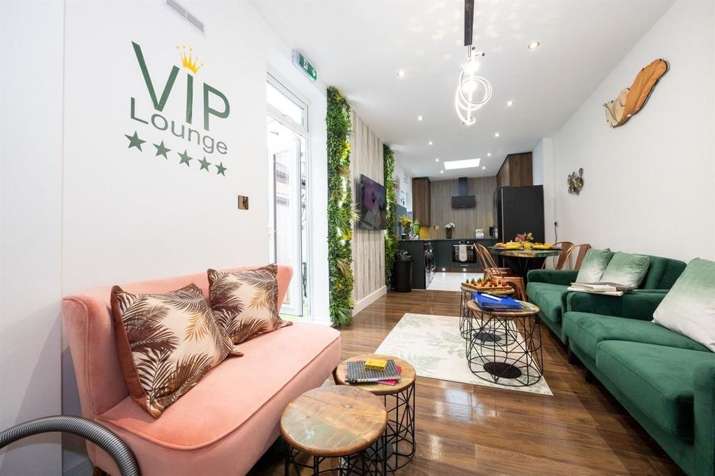 Property photo 2 of 15 A Stylish And Contemporary Living Room Featuring A...