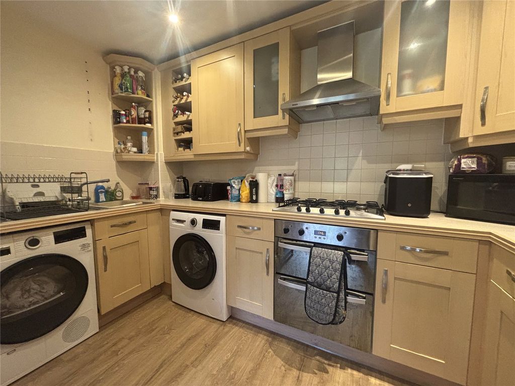 Property photo 3 of 7 Kitchen