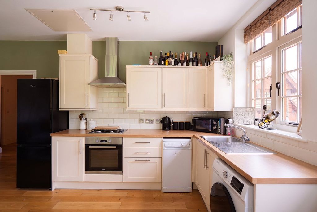 Property photo 3 of 17 Kitchen Area