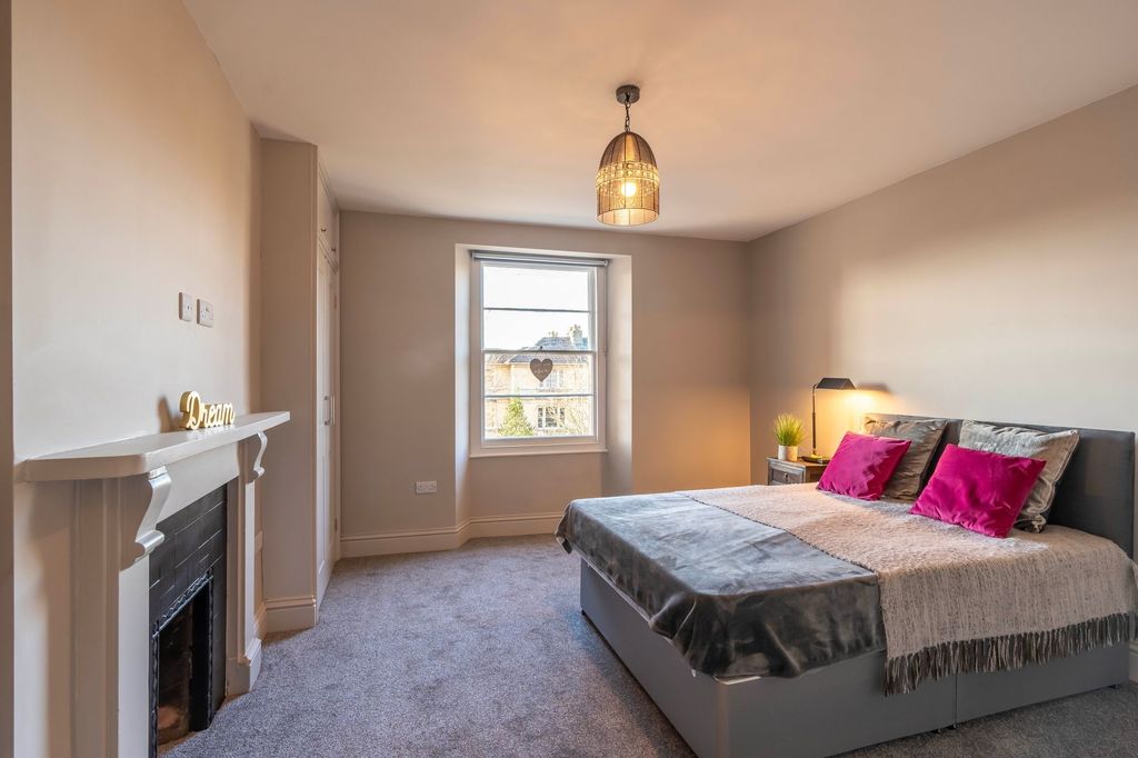 Property photo 1 of 9 Bright, Spacious Bedroom With Stylish Fireplace...