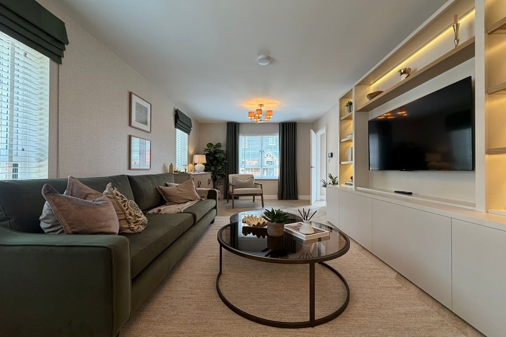 Property photo 3 of 14 Living Room With Modern Furnishings And Large Windows Allowing Natural Light