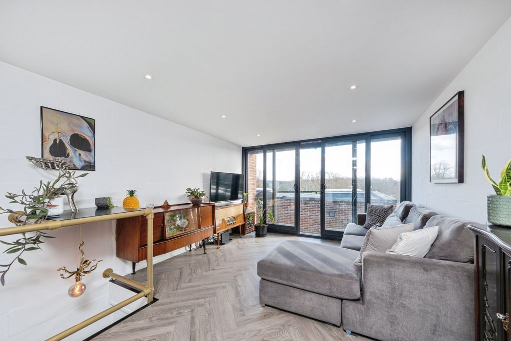 Property photo 3 of 17 Living Area