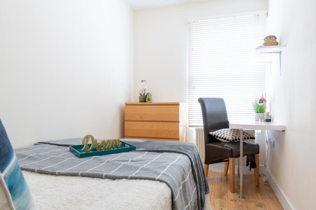 Property photo 3 of 15 This Stylish Double Bedroom Features A Comfortable...