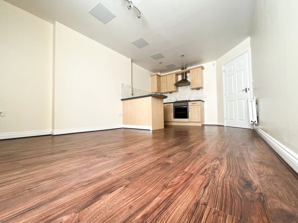 Property photo 2 of 11 Front Room 2