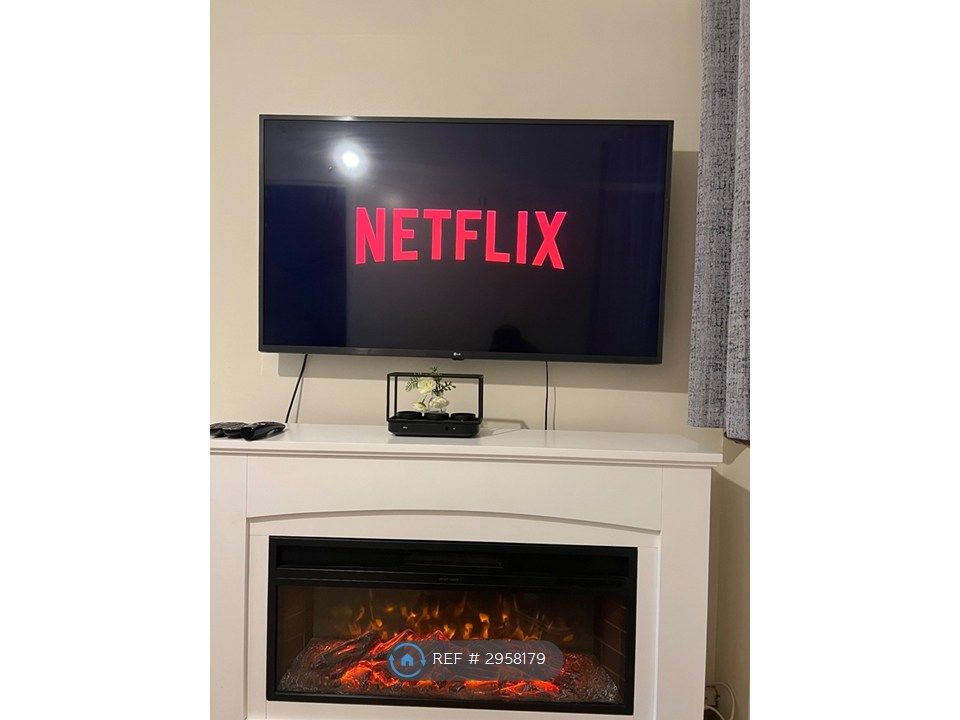 Property photo 2 of 9 Smart Tv &amp; Electric Fireplace