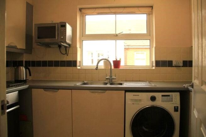 Property photo 3 of 8 Kitchen