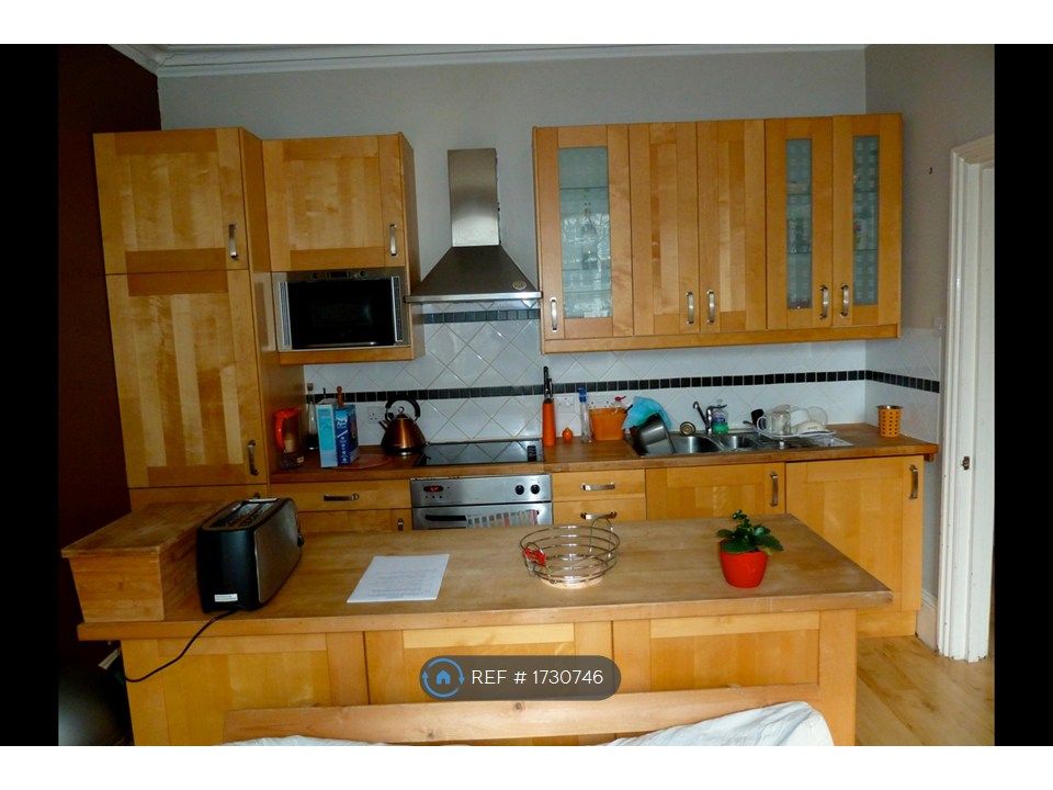 Property photo 2 of 8 Kitchen Area