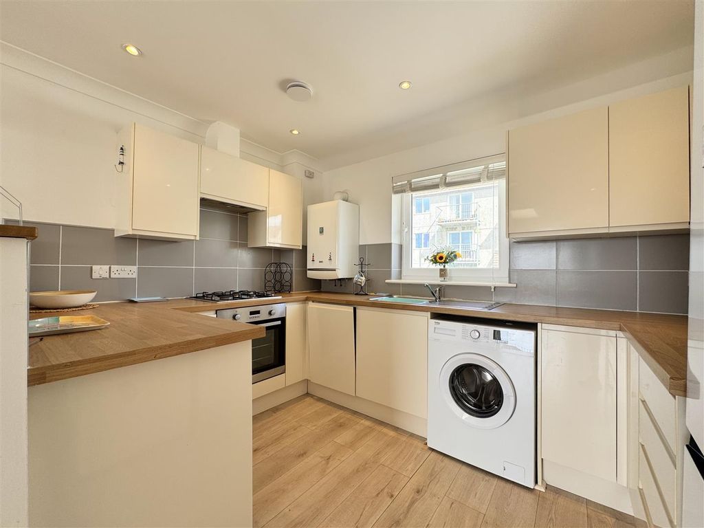 Property photo 2 of 18 Kitchen Area