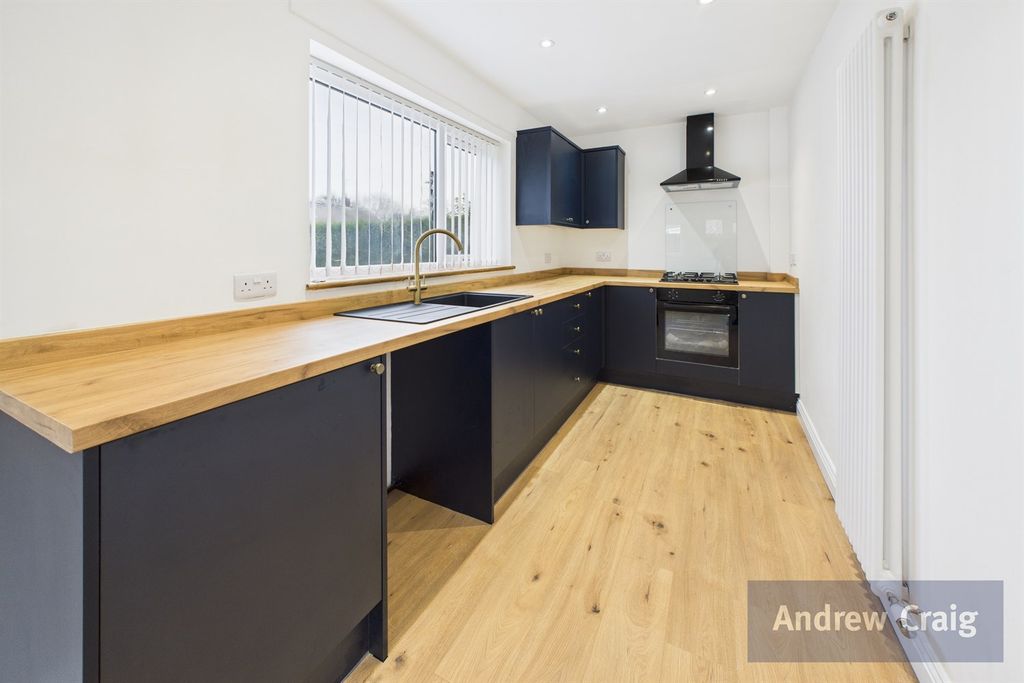 Property photo 3 of 12 Kitchen