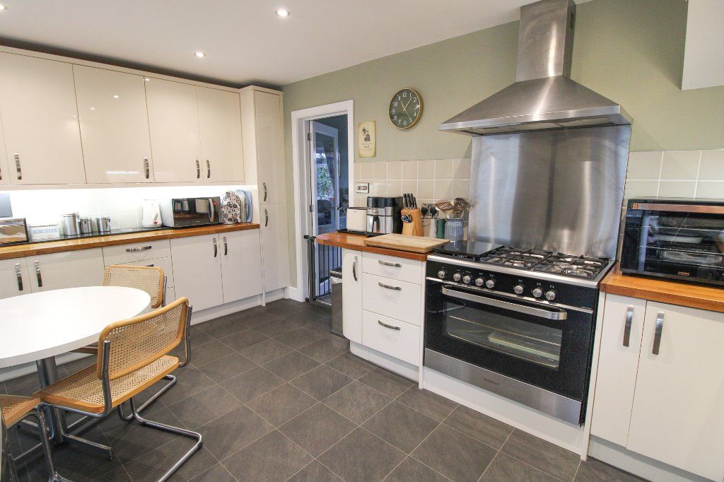 Property photo 3 of 15 Dining Kitchen