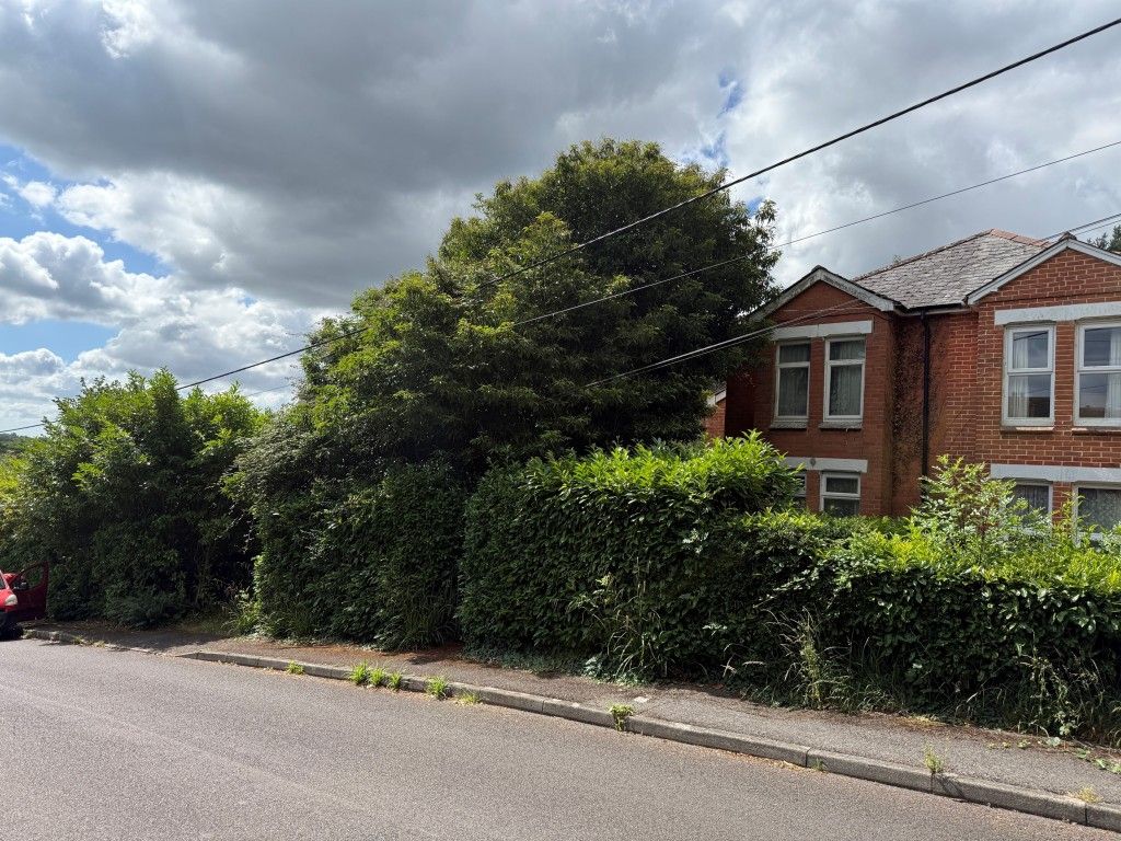 Property photo 1 of 11 Front View Of The Building From The Main Road