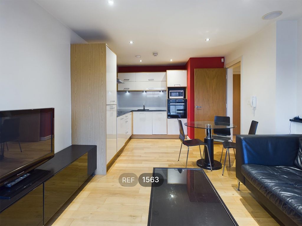 Property photo 3 of 13 Kitchen &amp; Living Area
