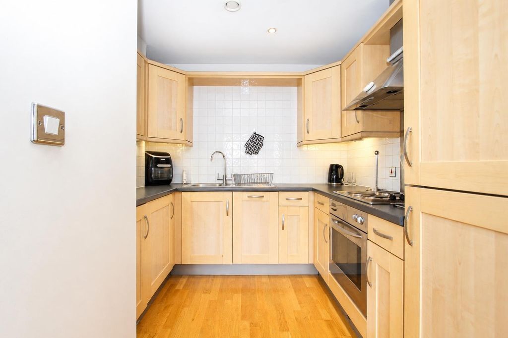Property photo 3 of 11 Clean Kitchen With Modern Wooden Cabinets...