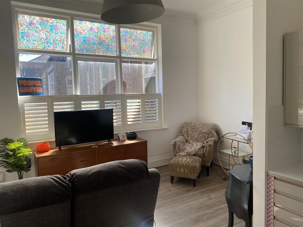 Property photo 3 of 9 Living Area