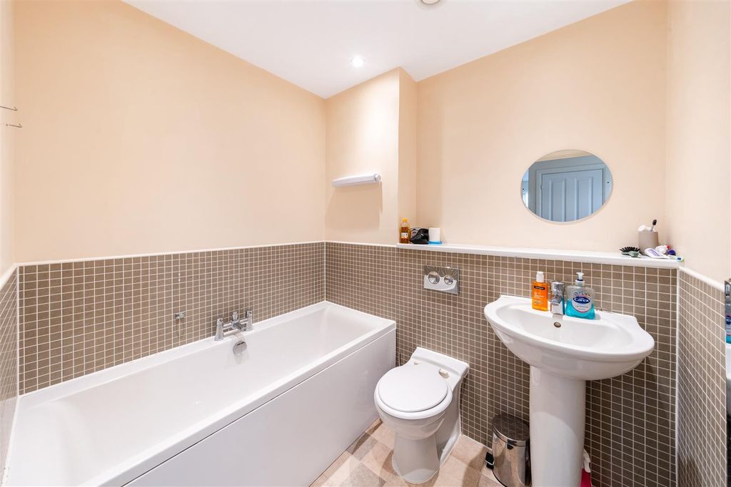 Property photo 3 of 20 Elegant Bathroom With A Large Bathtub And Tiles...