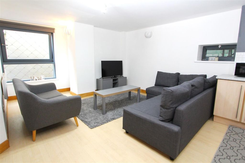 Property photo 3 of 8 Spacious Modern Lounge With Stylish Sofa Area And ...