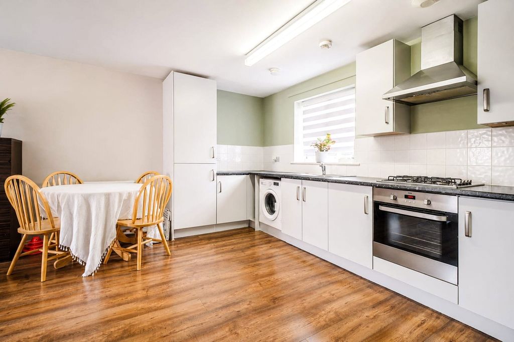 Property photo 2 of 12 Kitchen &amp; Dining