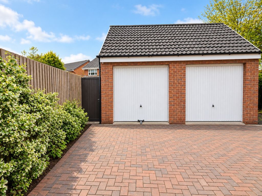 Property photo 2 of 13 Garage