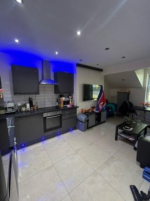 Property photo 2 of 9 A Modern, Well-Lit Living Room With Contemporary F...