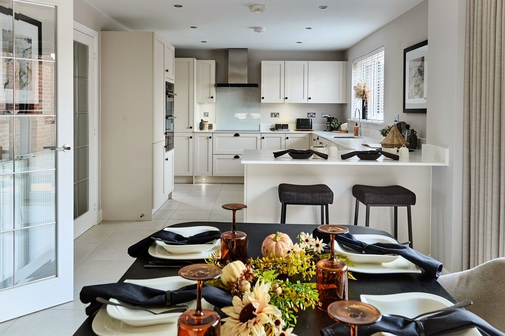 Property photo 3 of 9 A Breakfast Bar And Space For A Dining Area Creates Sociable Mealtimes In The Rightford