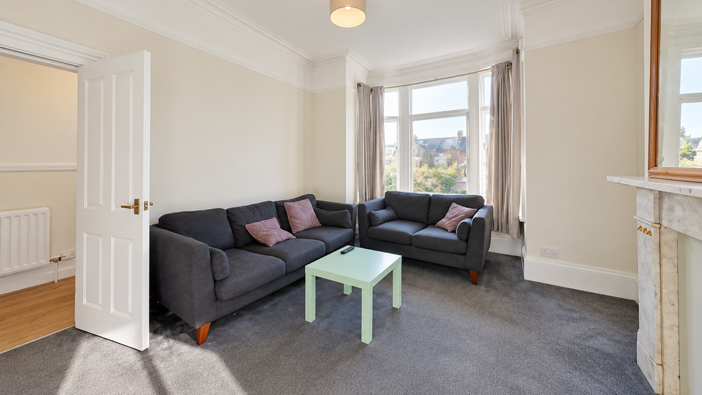 Property photo 3 of 16 Sunlit Victorian Living Room