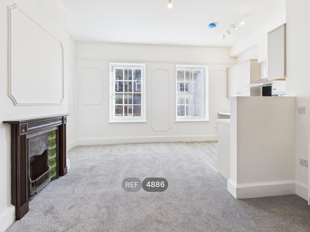 Property photo 2 of 9 Kitchen/Living Area