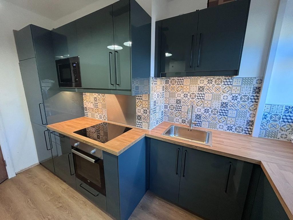 Property photo 2 of 18 Kitchen