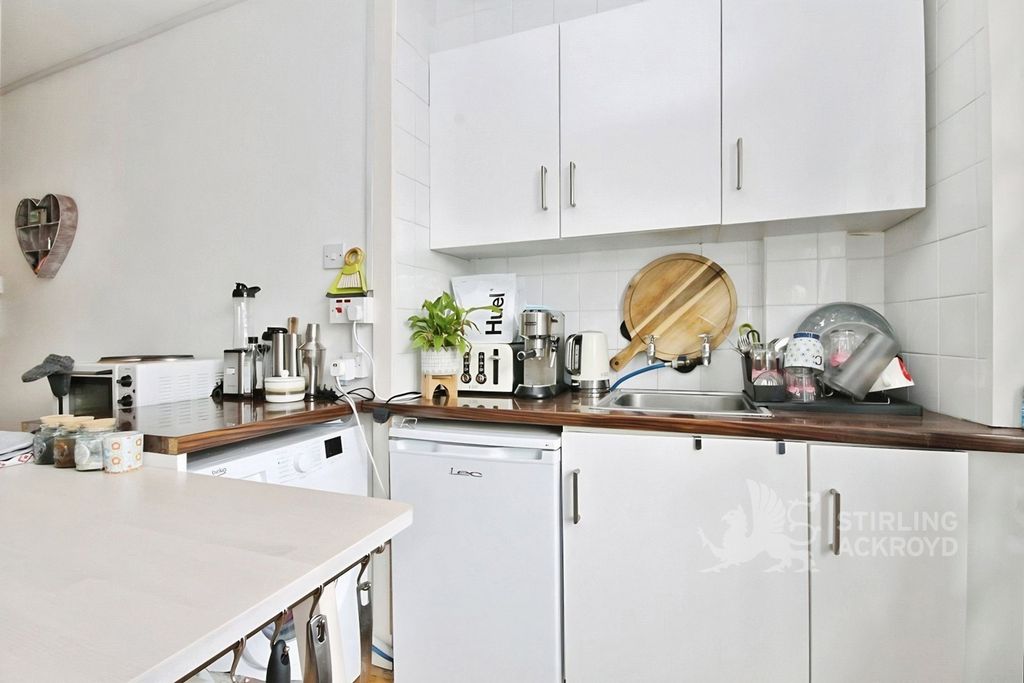 Property photo 2 of 6 Kitchen Area