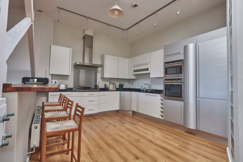 Property photo 2 of 14 Kitchen Area