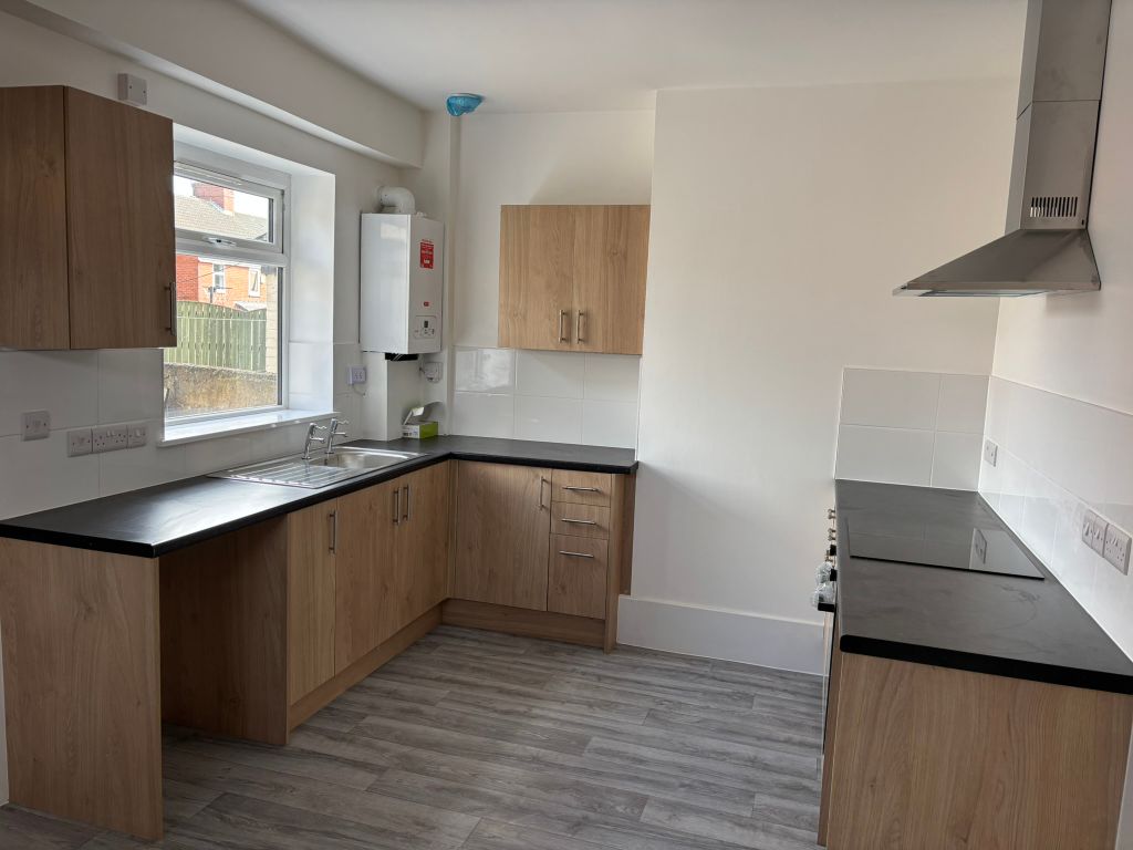 Property photo 3 of 9 Dining Kitchen