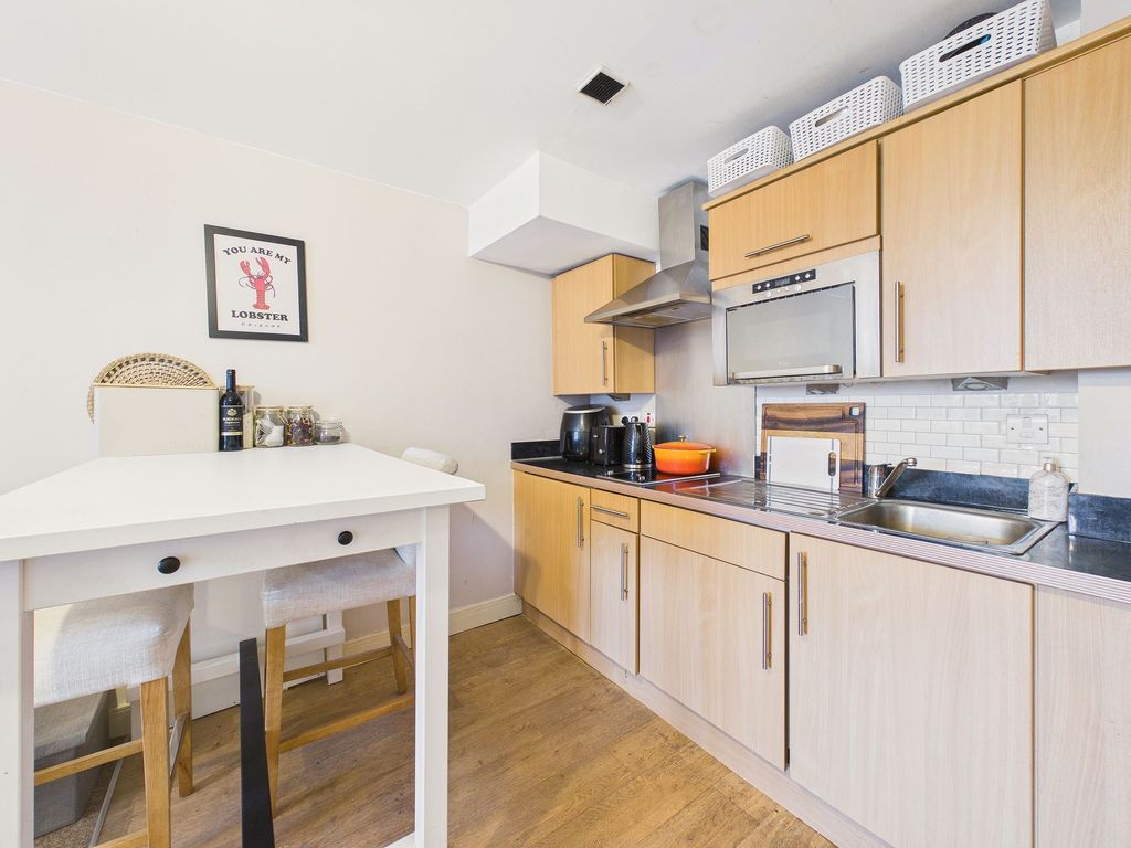 Property photo 2 of 11 Dining Kitchen