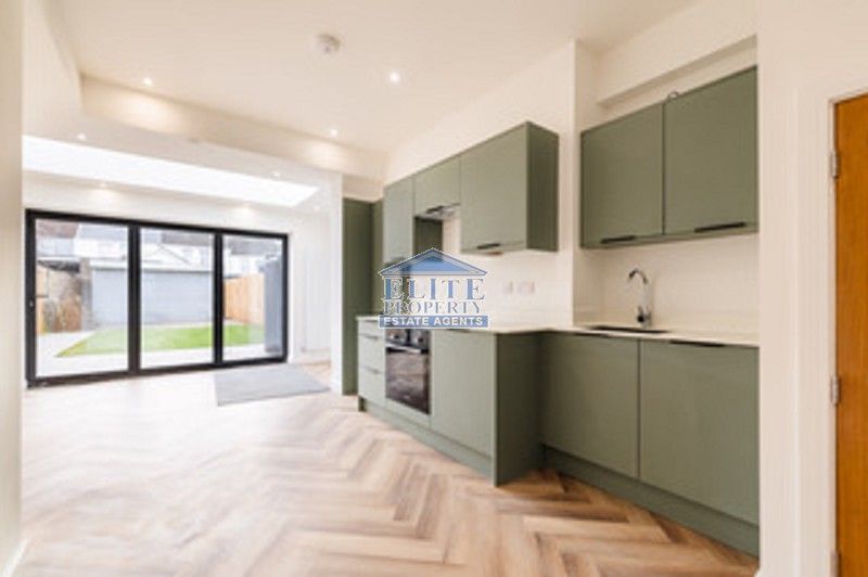 Property photo 2 of 12 Kitchen Area