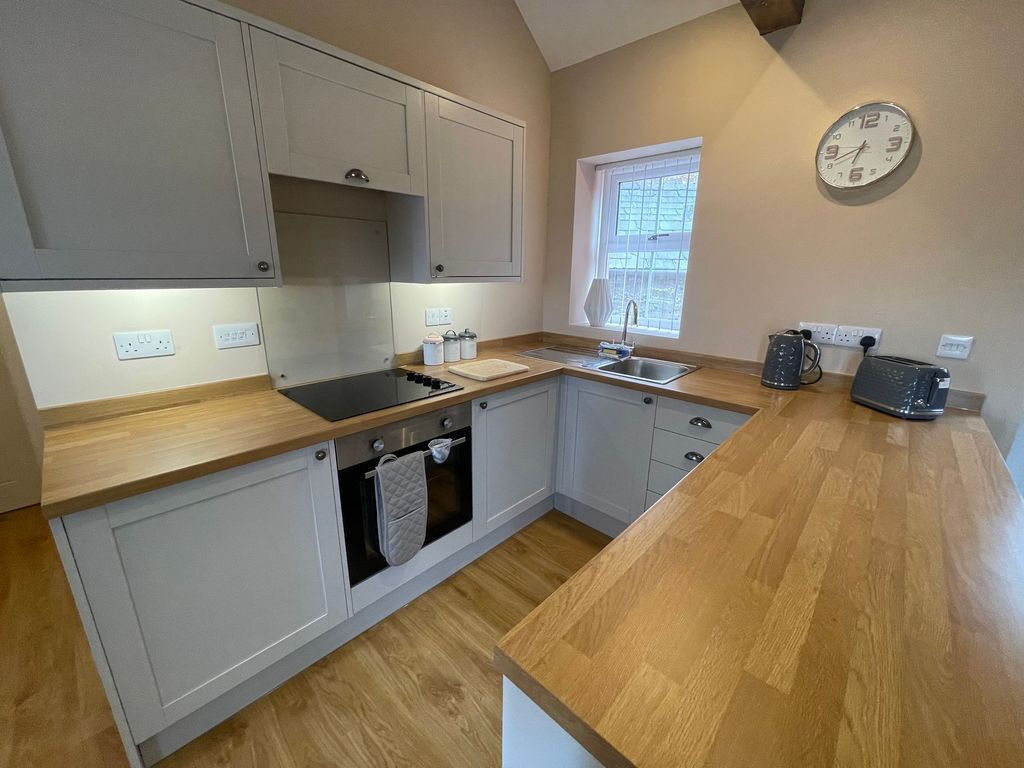 Property photo 2 of 12 Kitchen