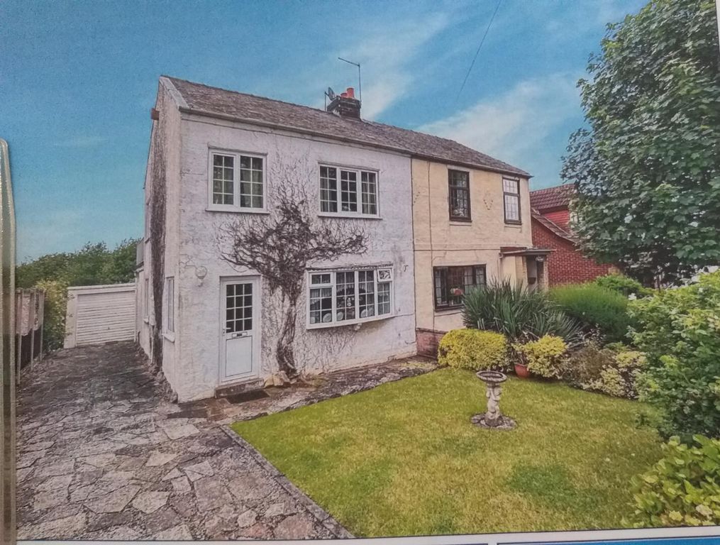 Property photo 1 of 12 Front (Exterior)