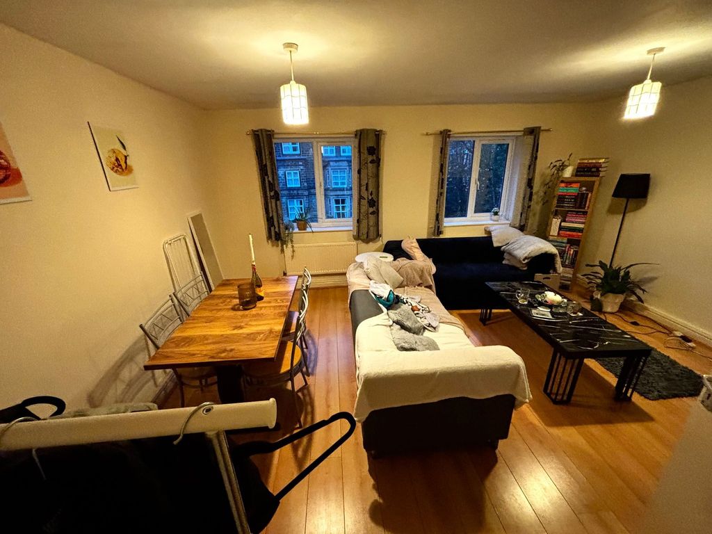 Property photo 1 of 8 Warm, Well-Furnished Living Room With Wooden Floor...