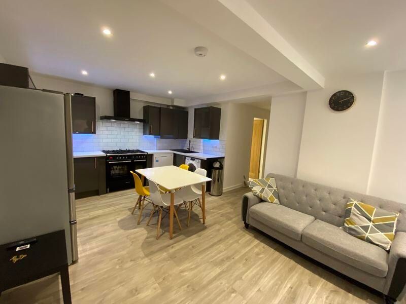 Property photo 3 of 13 Modern And Inviting Living Area Featuring Contempo...