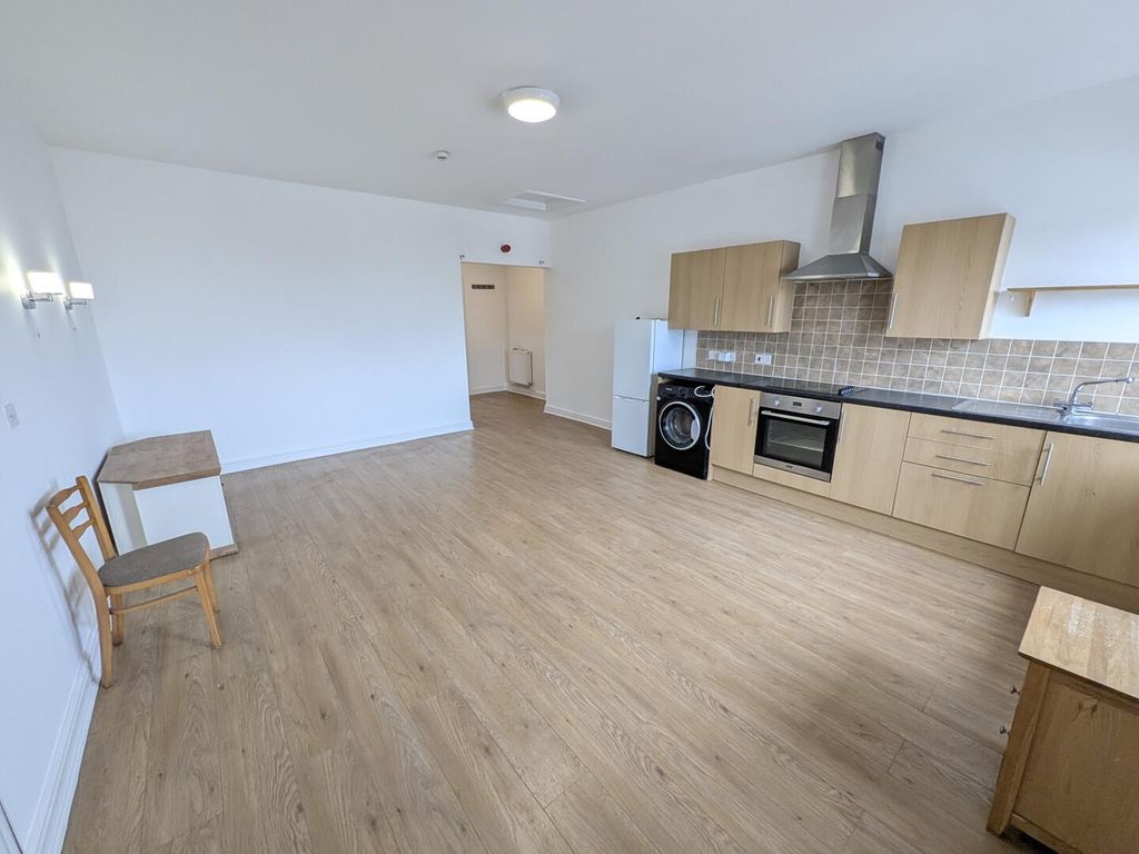 Property photo 3 of 7 Kitchen