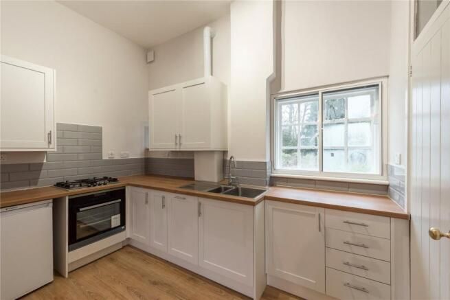 Property photo 3 of 12 Kitchen