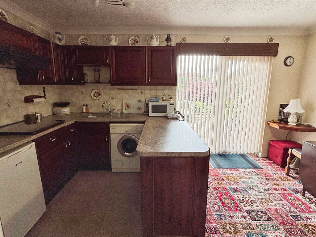Property photo 3 of 12 Dining Kitchen