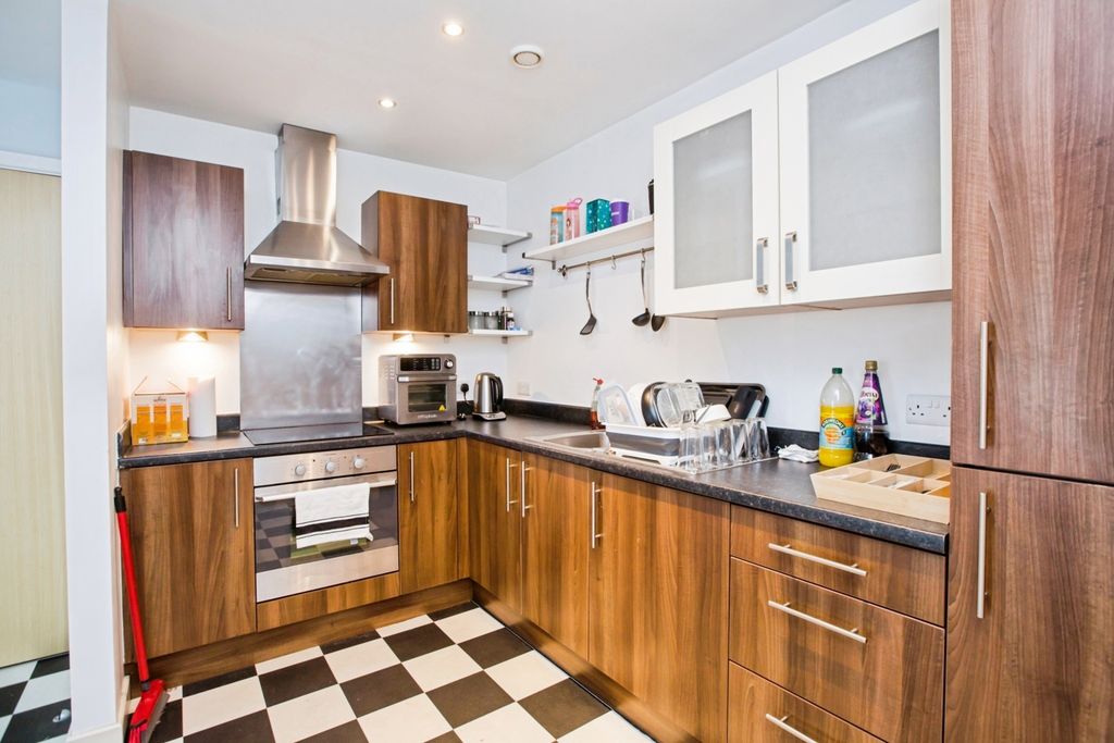 Property photo 3 of 17 Kitchen Area
