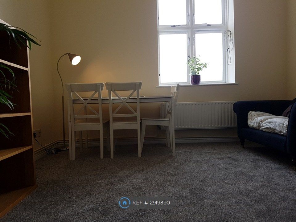 Property photo 3 of 7 Living & Dining Area